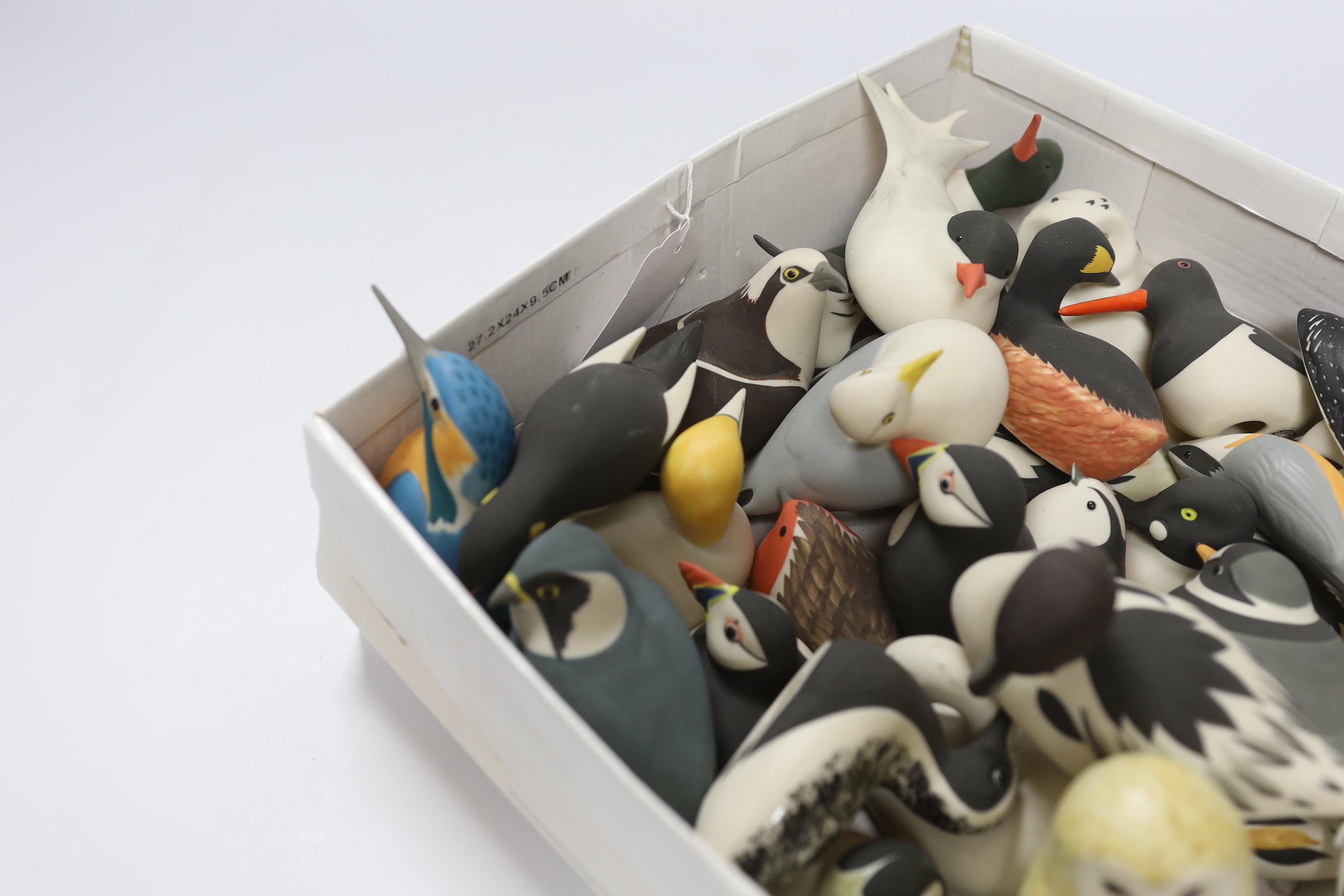 A collection of Isle of Arran ceramic birds